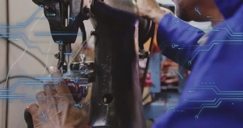 Vertical video: Tech turning wheel and red knob, aligning textile as circuit Stockbeeldmateriaal 331006239