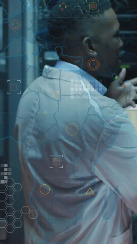 Vertical video: Tech using rack and mic, testing systems, AR overlays mapping Stock Footage 331617040