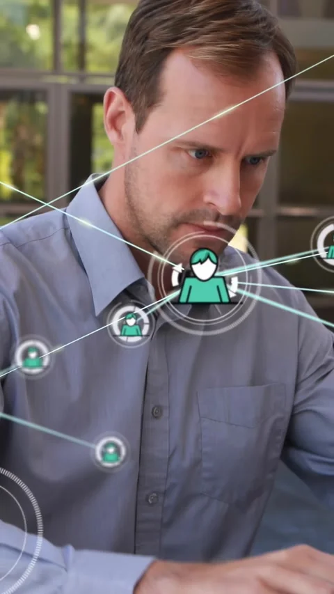 Vertical video: Tech worker typing while chest holo icon appearing expanding Stock Footage 331128671