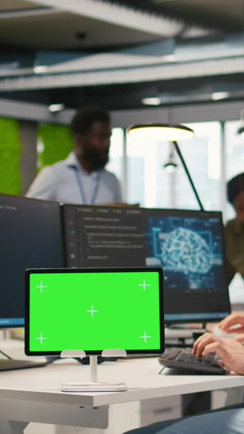 Vertical video Technician developing applications using chroma key tablet Video stock 312708675