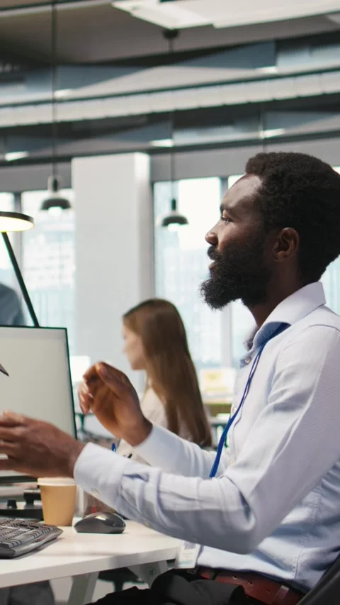 Vertical video Technician using PC to code, testing applications to minimize Stock Footage 312708742
