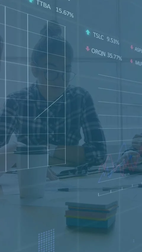 Vertical video: Teen analyst tapping tablet causing finance charts crossing Stock Footage 333464919
