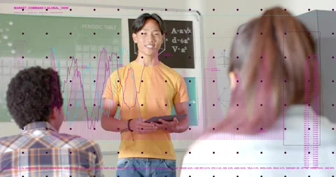 Vertical video: Teen presenting in class holding tablet graph overlay appearing Stock Footage 334109143