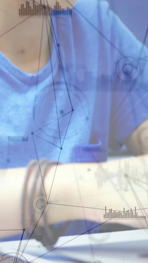 Vertical video: Teen studying, camera panning showing learning overlays on Stock Footage 331274127