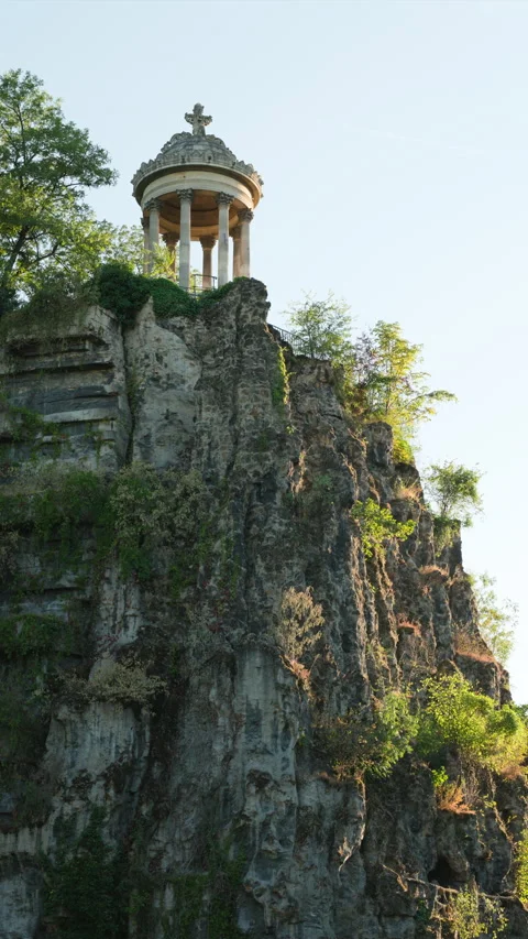 Vertical Video of Temple de la Sibylle on High Cliff at Parc des Buttes-Chaumont Stock Footage 338382962