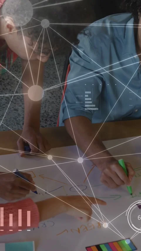 Vertical video: Three colleagues picking markers, drawing business plan while AR Stock Footage 333603802