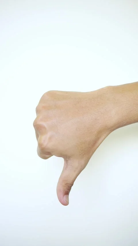 Vertical video. Thumb down. Negative feedback. Vote against. Bad choice Stock Footage 322109708