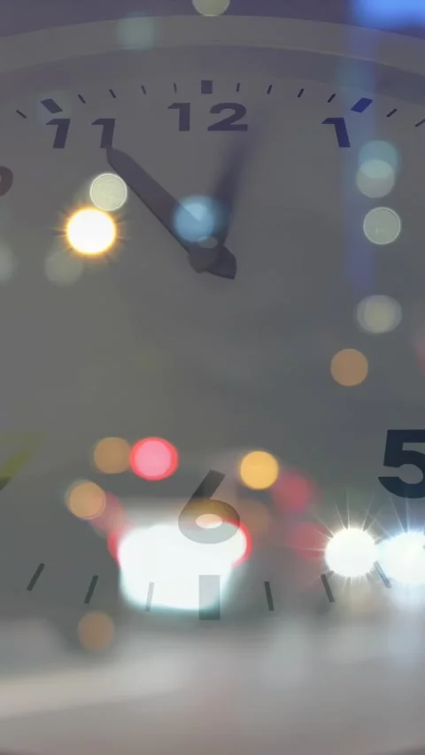 Vertical video: Tick causing hands turning right while bokeh lights shifting, Stock Footage 328221539
