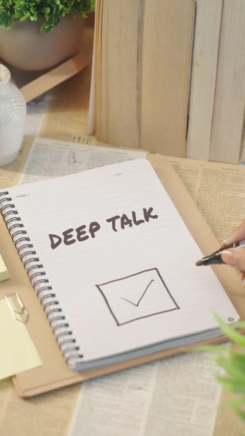 VERTICAL VIDEO OF TICKING OFF DEEP TALK FROM CHECKLIST Stock Footage 308083466