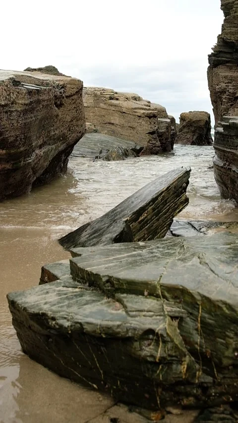 Vertical video of tide entering through the rocks Stock Footage 251577683