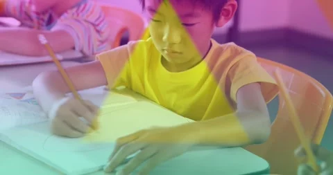 Vertical video: Tight cam pullback starting boy in tee drawing circles, tint Stock Footage 330981261