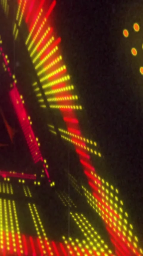 Vertical video: On tilt LED-wall pulsing, yellow dots converging, red accents Stock Footage 348375547