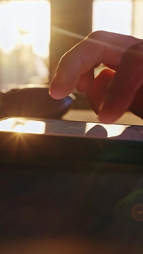 Vertical video. Time Lapse Close Up Of Human Hand Scrolling News Feed And Social Stock Footage 328589172