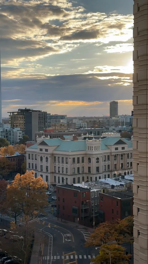Vertical Video Time Lapse of Sunset on City Street Corner Stock Footage 256503880