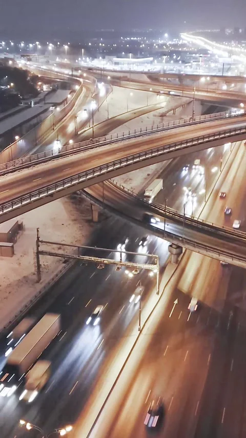 Vertical video, time-lapse traffic on a road junction Stock Footage 167495192