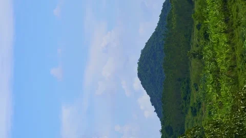 Vertical video. Timelapse Beautiful view of a mountain view with moving clouds Stock Footage 255758044