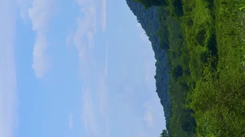Vertical video. Timelapse Beautiful view of a mountain view with moving clouds Stock Footage 255758048