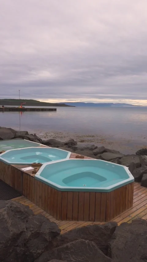 Vertical Video - Timelapse Sunrise Hot Pot Hot Tubs in Iceland Slow Zoom Out Stock Footage 258486365