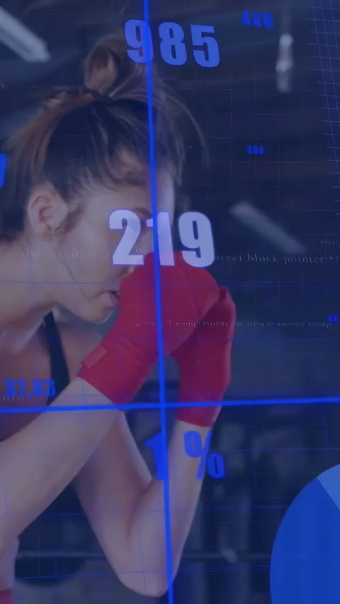 Vertical video: Timer starting, boxer throwing jabs, rotating while blue overlay Stock Footage 334319536