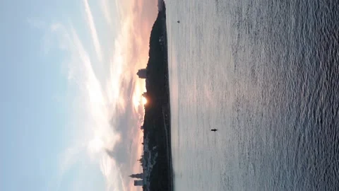 Vertical video Top Aerial view Colored evening summer sky. sailing motor boat Video stock 157656080