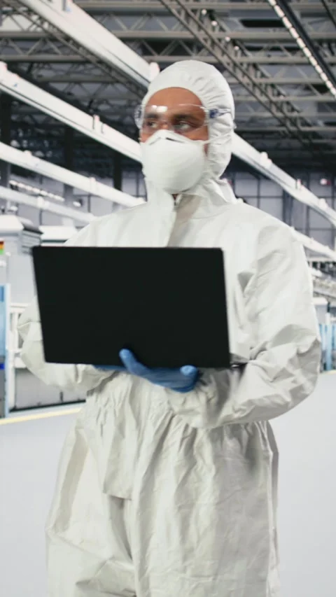Vertical video Tracking semiconductor fabrication lots, laptop software and Stock Footage 333615412