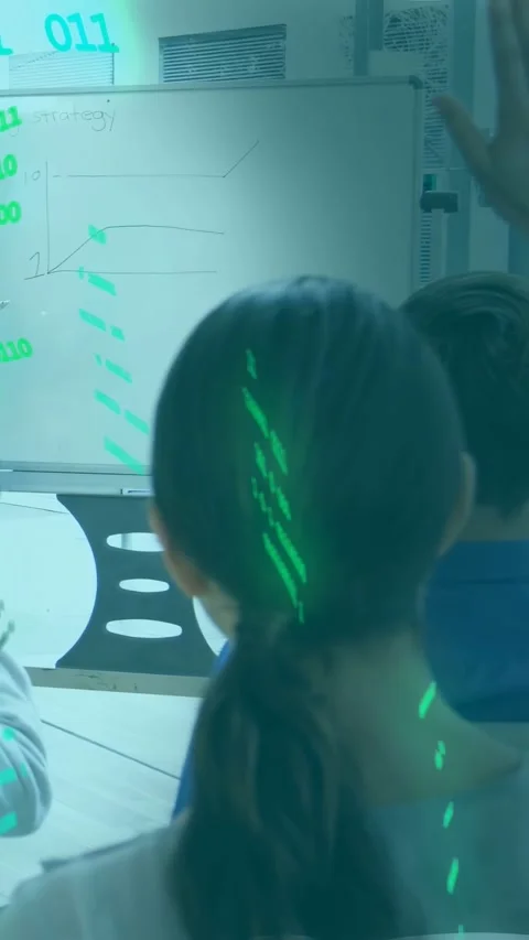 Vertical video: Trainer pointing, causing green code over chart during tech Vidéo 337543358