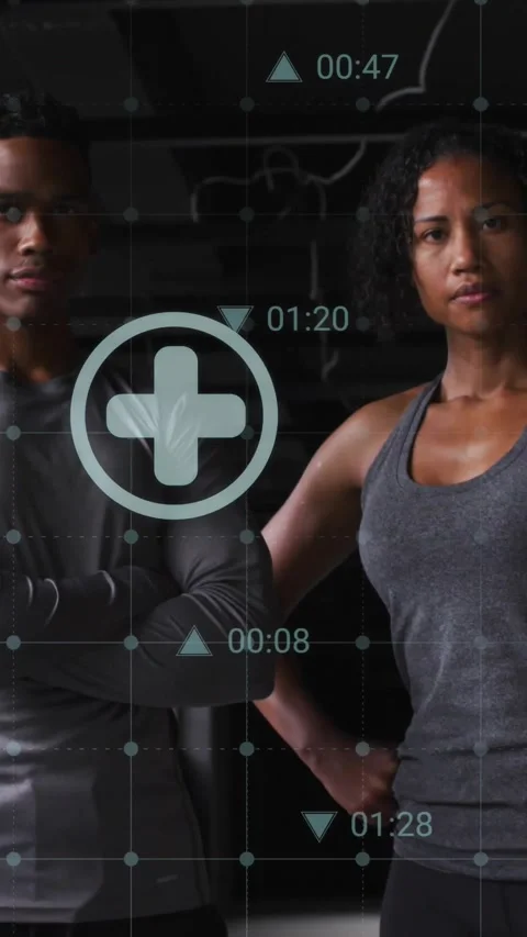 Vertical video: Trainers posing at gym HUD activating and animating health icons Stock Footage 330509985