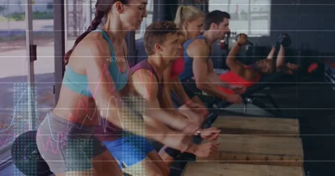 Vertical video: Training group hearing cue, doing synced box jumps on plyo Stock Footage 334179022