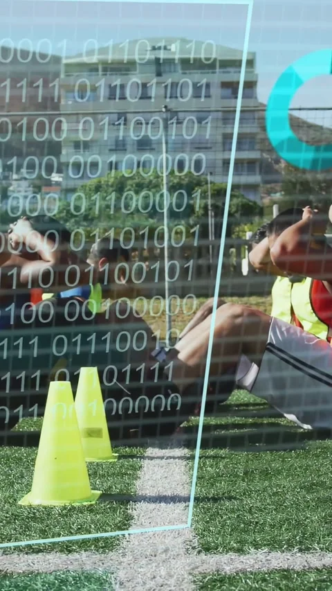 Vertical video: Training team doing sit-ups on turf, partner holding ankles Stock Footage 333603807