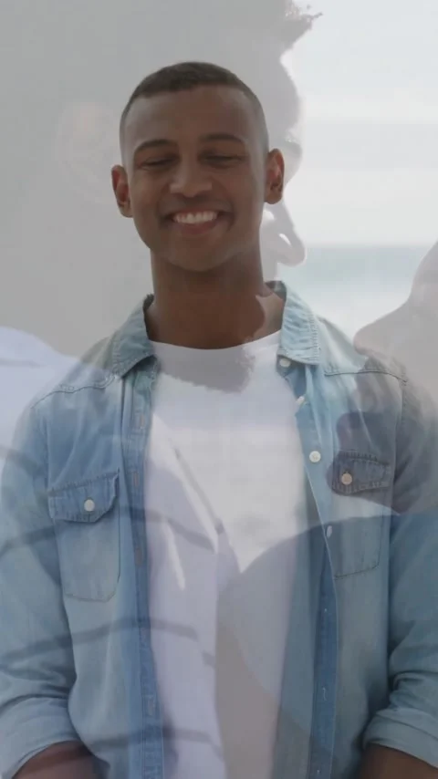 Vertical video: Translucent overlay aligning behind man, causing smiling and Stock Footage 333320014