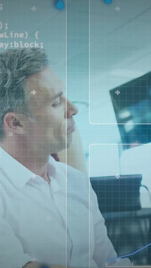 Vertical video: Turning man in pale shirt as woman moving using tablet in office Stock Footage 334541080