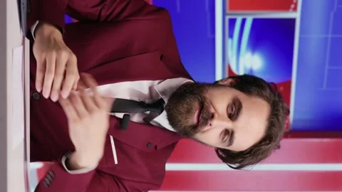 Vertical video TV program host presenting world news Video stock 247582716