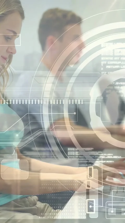 Vertical video: Two adults typing on keys for training input making HUD overlay Stock Footage 334396617