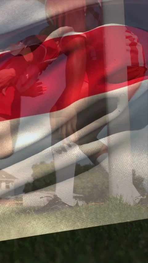 Vertical video: Two boys shifting near pole tying cleats for sports walking off Video stock 333513317