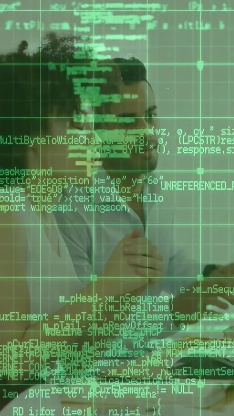 Vertical video: Two colleagues at table prompted by green HUD, leaning and Stock Footage 331168353