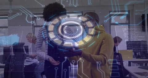 Vertical video: Two colleagues tapping tablet, causing pulsing AR HUD circuits Stock Footage 331160751