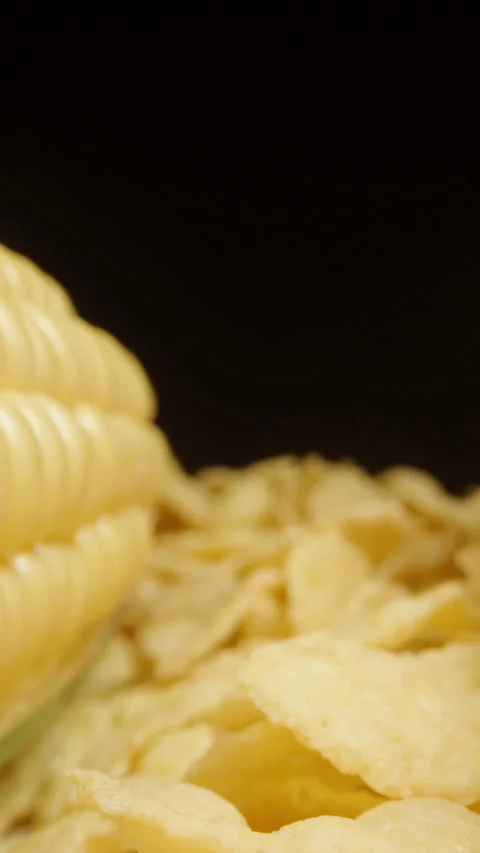 Vertical video. Two corn cobs are placed... | Stock Video | Pond5