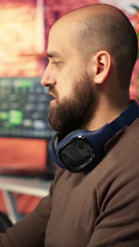 Vertical Video Two developers team interact with virtual AI assistant on PC Stock Footage 308492159