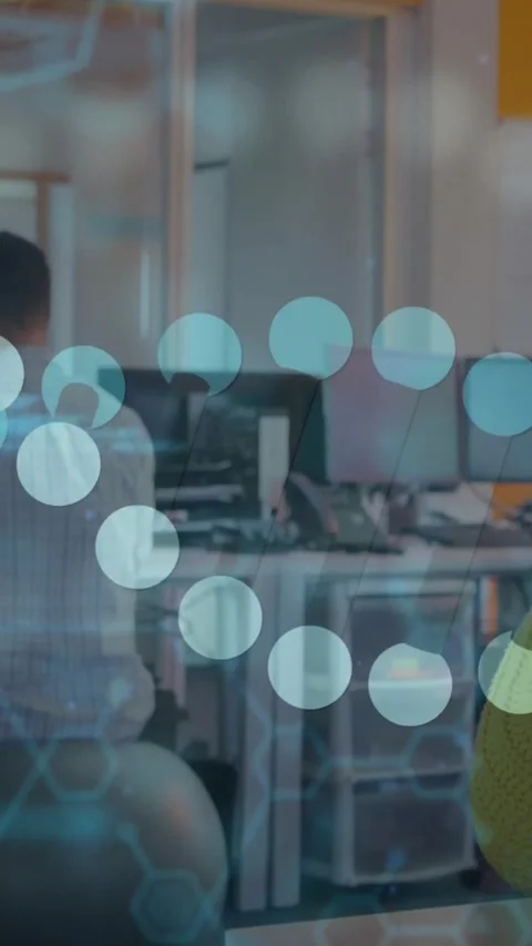 Vertical video: Two devs, tech code appearing, sweeping screens and obscuring Stock Footage 331790256