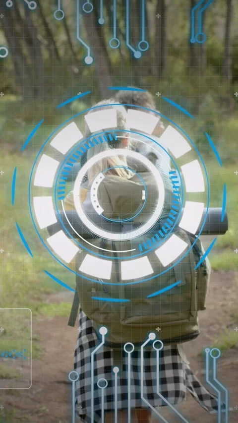 Vertical video: Two female hikers on trail, tech HUD locking on backpack tagging Stock Footage 333820859