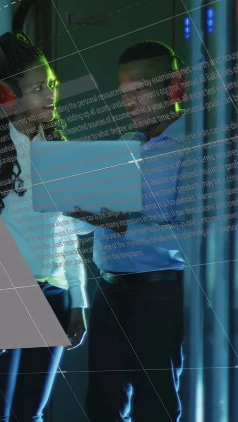 Vertical video: Two IT techs using laptop, man gesturing and adjusting, UI Stock Footage 332845723