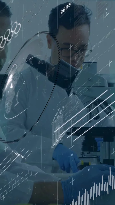 Vertical video: Two lab researchers peering microscope, handling vial, data Stock Footage 332669613