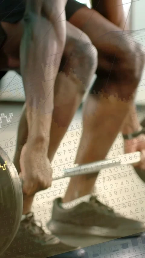 Vertical video: Two men gripping barbell, pulling up while charts overlaying to Stock Footage 333632962