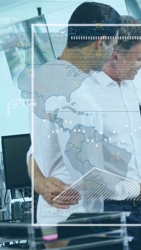 Vertical video: Two men, left man reaching, pulling closer, viewing business map Stock Footage 334397389