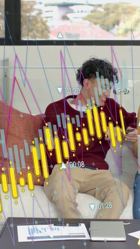 Vertical video: Two men sitting, right man handing phone, left reviewing Vídeo Stock 334025544