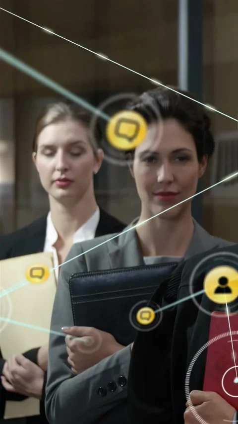 Vertical video: Two staff holding folders streaks sparking icons forming Stock Footage 334397007