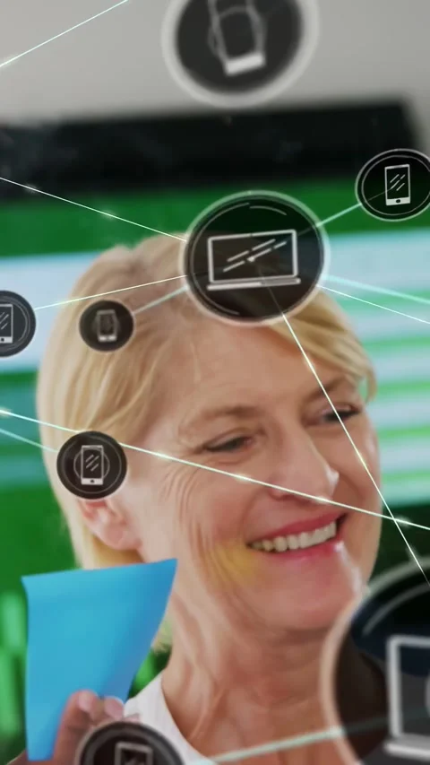 Vertical video: Two tech pros holding blue folder demoing phone and laptop icons Stock Footage 334540424