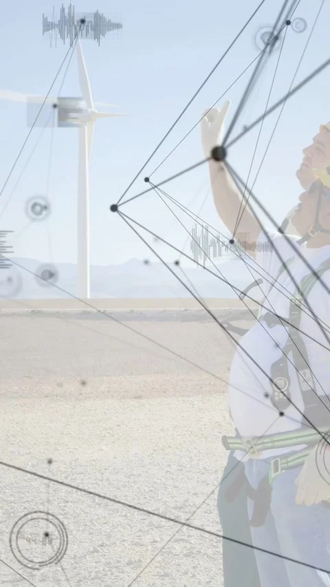 Vertical video: Two techs pointing at turbine windfarm, starting HUD nodes Stock Footage 332546903