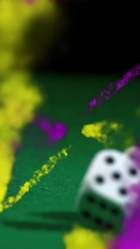 Vertical video: Two white dice rolling right as plumes erupting and sweeping, Stock Footage 328398857