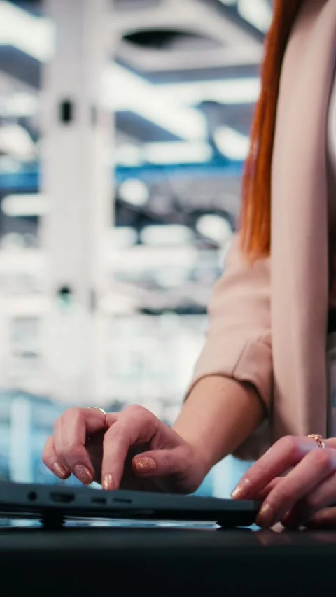 Vertical video Typing, laptop close up and engineer in server farm Stock Footage 330028178